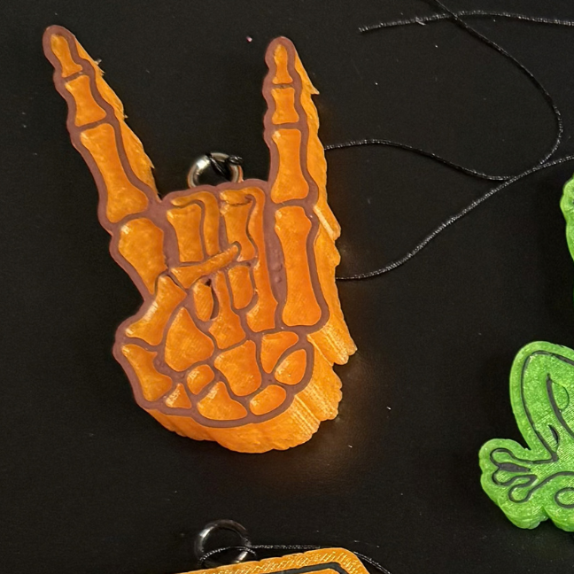 Rock out Skeleton Hand Freshie - Cherry Bomb