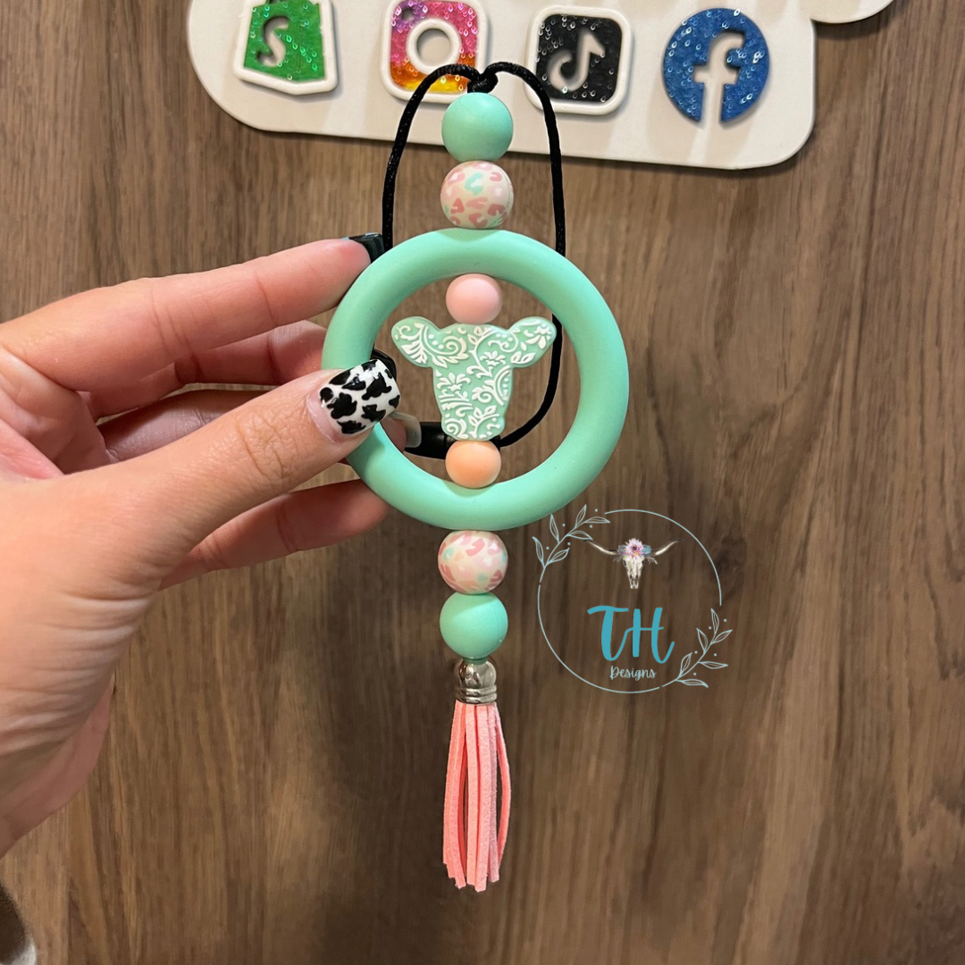 Teal cow w/ pink Car Charm